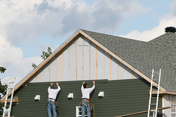 Professional Emergency Siding Repair technician working in Oxford, PA